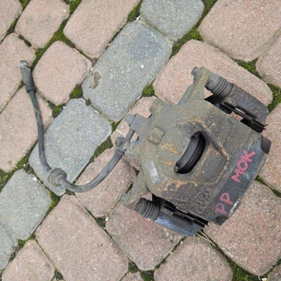 Zacisk przód przedni prawy Astra J IV Opel Mokka 13430603