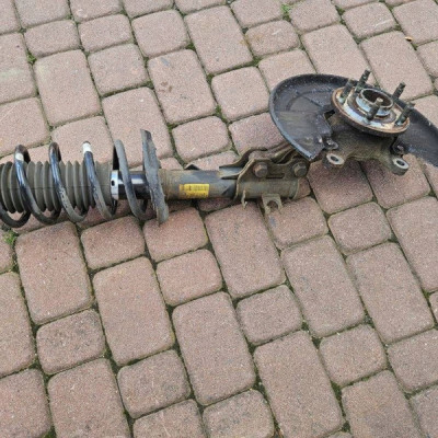 Amortyzator zwrotnica McPherson lewy 1.4Turbo Opel Mokka 95353834