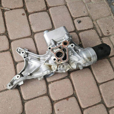 Łapa podstawa filtra oleju 2.0TSI TFSI Volkswagen Golf 7 VII GTI 06L117021G