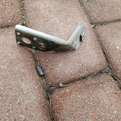 Błotnik wzmocnienie uchwyt błotnika lewy Opel Corsa E