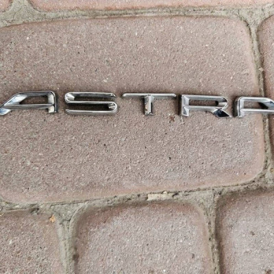 Napis logo emblemat na klapę tylną OPEL ASTRA L 6 VI