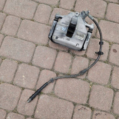 Zacisk hamulca hamulcowy jażmo przód przedni lewy OPEL ASTRA L 6 VI